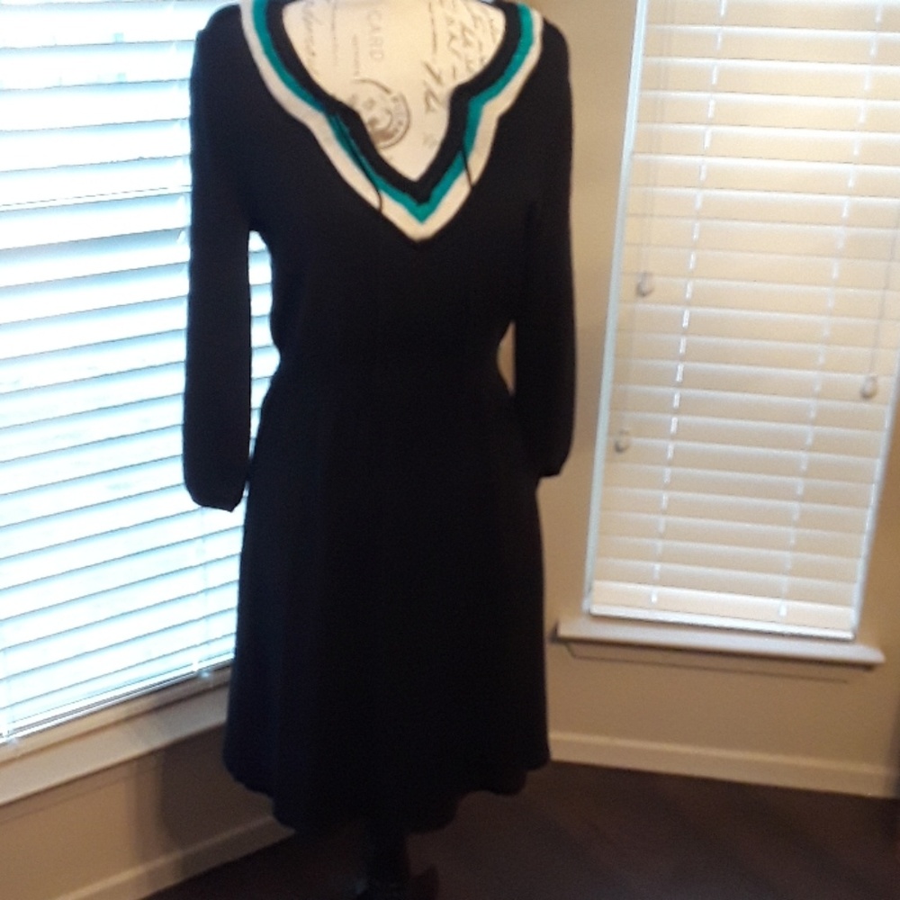 Knee-length knit dress.